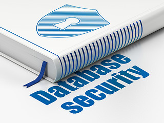 Image showing Protection concept: book Shield With Keyhole, Database Security on white background