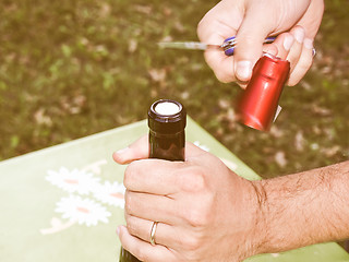 Image showing Retro looking Bottle opening