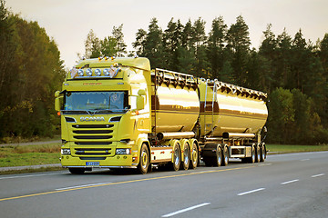 Image showing Yellow Scania R580 Tank Truck on the Road in Evening