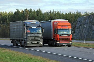 Image showing Scania Semi Truck Overtakes another Truck