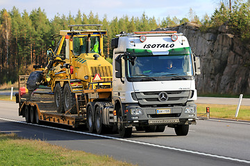 Image showing White Mercedes-Benz Actros Hauls Road Maintenance Equipment