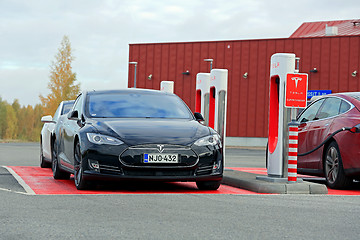 Image showing Tesla Model S Cars at a Supercharger Station