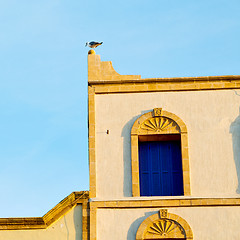 Image showing   yellow window in morocco africa old construction and brown wal