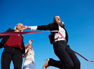 Image showing business people running on racing track