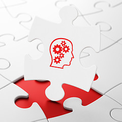 Image showing Marketing concept: Head With Gears on puzzle background