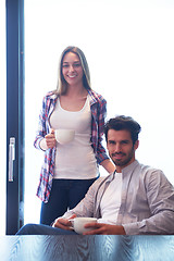 Image showing relaxet young couple drink first morning coffee