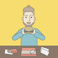 Image showing Man eating hamburger. 