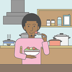 Image showing Man eating salad.