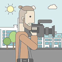 Image showing Cameraman with video camera