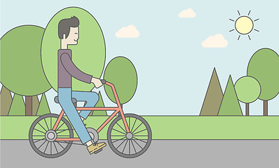Image showing Asian man riding bicycle in park.