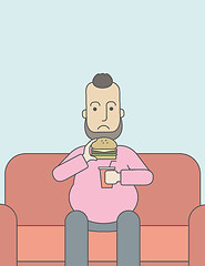 Image showing Man eating hamburger. 