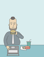 Image showing Man eating hamburger. 