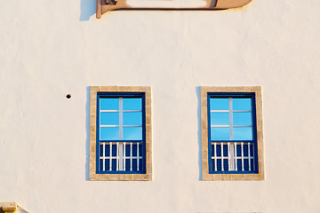 Image showing blue window in morocco africa  and  wall  construction