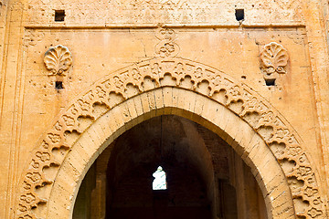 Image showing old door in morocco   wall ornate   yellow