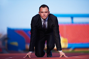 Image showing business man ready to sprint