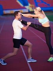 Image showing sporty woman on athletic race track