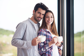 Image showing relaxet young couple drink first morning coffee