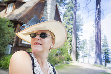 Image showing 1920s Dressed Woman Near Antique House