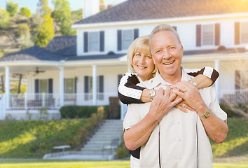 Image showing Happy Senior Couple in Front Yard of House