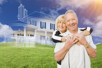 Image showing Senior Couple In Front of Ghosted House Drawing on Grass