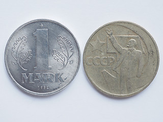 Image showing Vintage Russian ruble coin and German mark coin