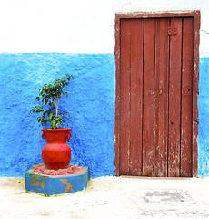 Image showing historical blue  in  antique building door morocco      style af