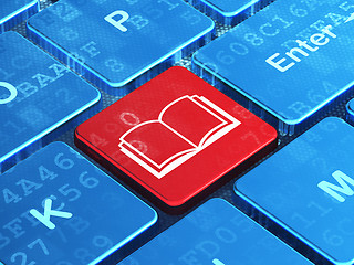 Image showing Learning concept: Book on computer keyboard background