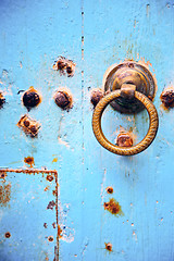 Image showing rusty metal   nail dirty  and morocco knocker