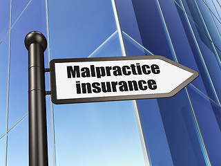 Image showing Insurance concept: sign Malpractice Insurance on Building background