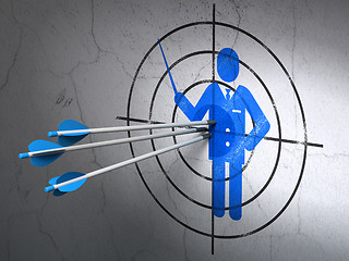 Image showing Education concept: arrows in Teacher target on wall background