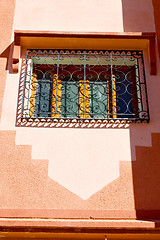 Image showing   window in morocco  old construction and brown wall  