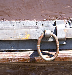 Image showing crugnola abstract   rusty brass brown knocker in  