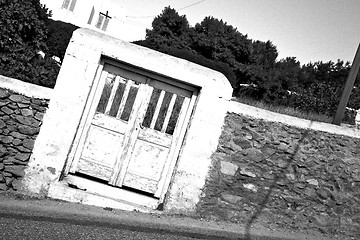 Image showing blue door in  village  greece europe and    white wall