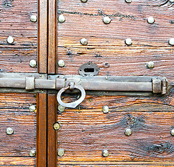 Image showing italy  patch lombardy    cross  r in a  door curch  wood