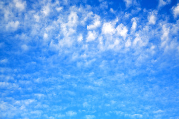 Image showing in the blue sky white soft clouds and abstract  