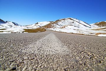 Image showing hill in   africa  valley wild angle asphalt street white line cu