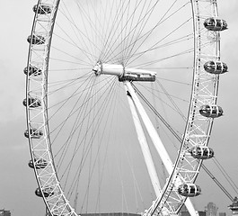 Image showing london eye in the spring sky and white clouds