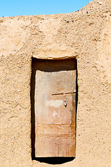 Image showing  door in morocco  ancien and wall ornate brown