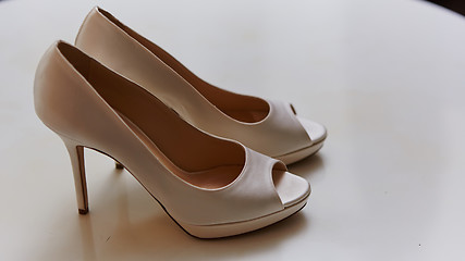 Image showing White wedding shoes for women.