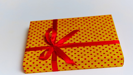 Image showing Gift box with ribbon on white background