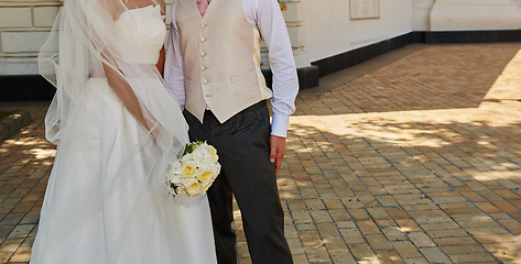 Image showing Elegant bride and groom posing together 