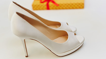 Image showing White wedding shoes for women.