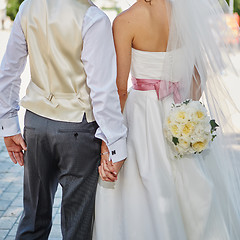 Image showing Elegant bride and groom posing together 