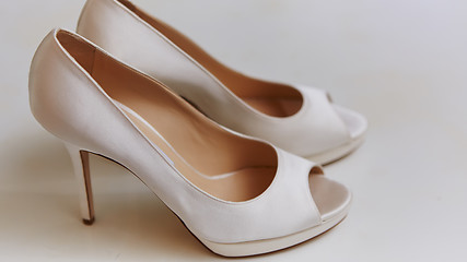 Image showing White wedding shoes for women.