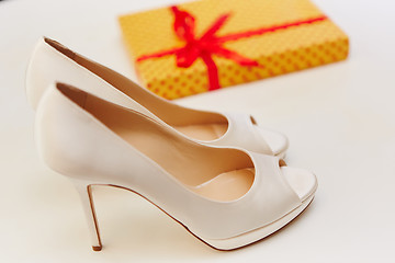 Image showing White wedding shoes for women.