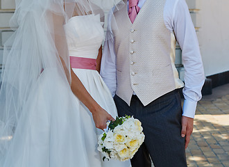 Image showing Elegant bride and groom posing together 