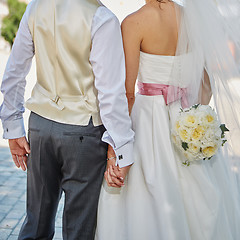 Image showing Elegant bride and groom posing together 