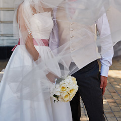 Image showing Elegant bride and groom posing together 