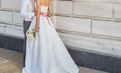 Image showing Elegant bride and groom posing together 