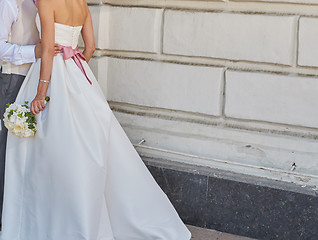 Image showing Elegant bride and groom posing together 